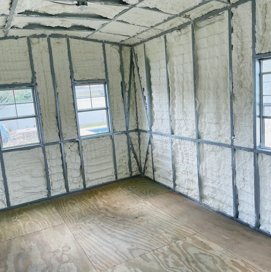 Closed-cell spray foam insulation applied to wall cavities in a residential project in Mounds View